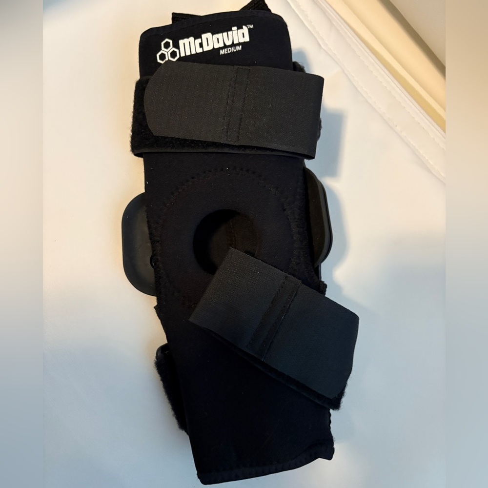 Black Knee Brace with joints and Straps Medium